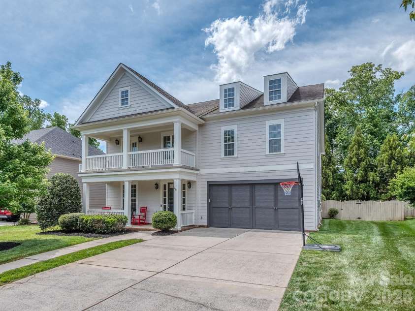 2008 Shalford Lane, Matthews, NC 28104.  MLS# CAR4364592, YatesRealty ID 20137. Double front porches