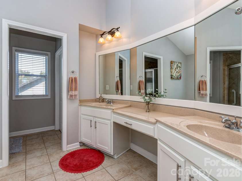 2008 Shalford Lane, Matthews, NC 28104.  MLS# CAR4364592, YatesRealty ID 20137. Primary bathroom 