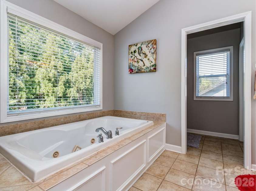 2008 Shalford Lane, Matthews, NC 28104.  MLS# CAR4364592, YatesRealty ID 20137. Primary bathroom
