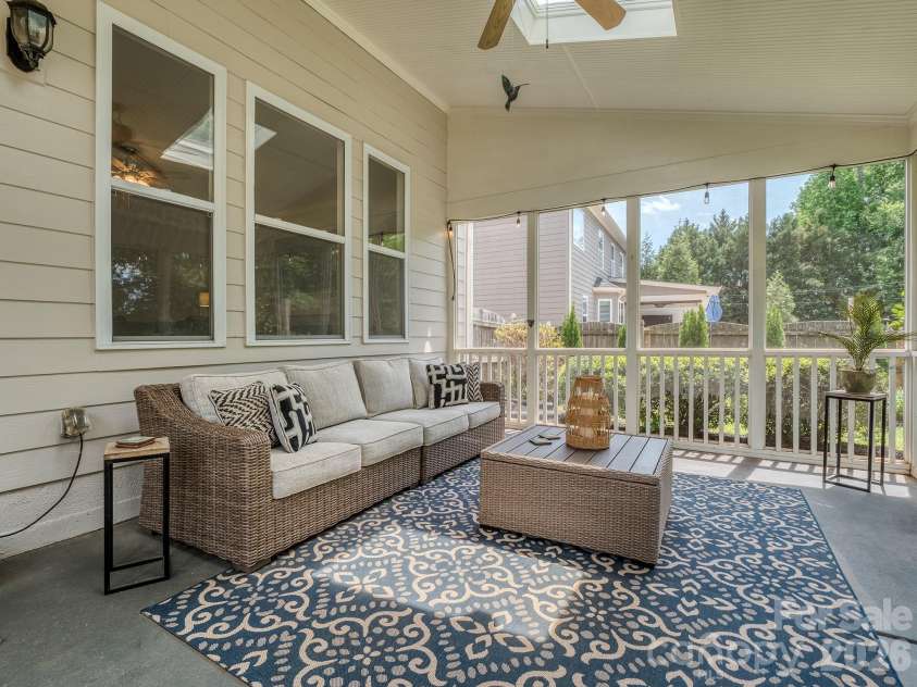 2008 Shalford Lane, Matthews, NC 28104.  MLS# CAR4364592, YatesRealty ID 20137. Screen back porch