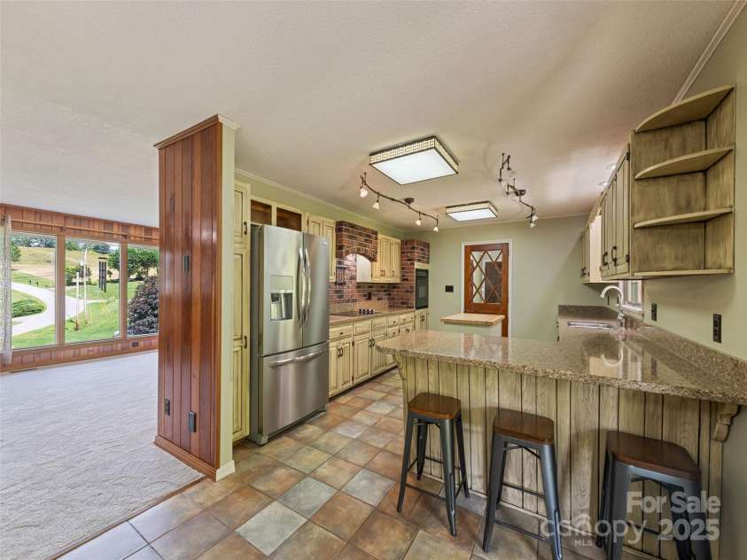 415 Crawford Road, Waynesville, NC 28785.  MLS# CAR4271871, YatesRealty ID 20137. 