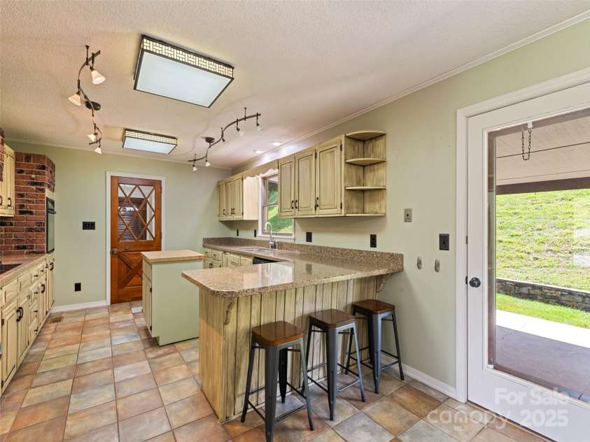 415 Crawford Road, Waynesville, NC 28785.  MLS# CAR4271871, YatesRealty ID 20137. 