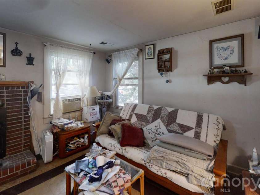 21 Maple Avenue, Candler, NC 28715.  MLS# CAR4273168, YatesRealty ID 2014. Living room view