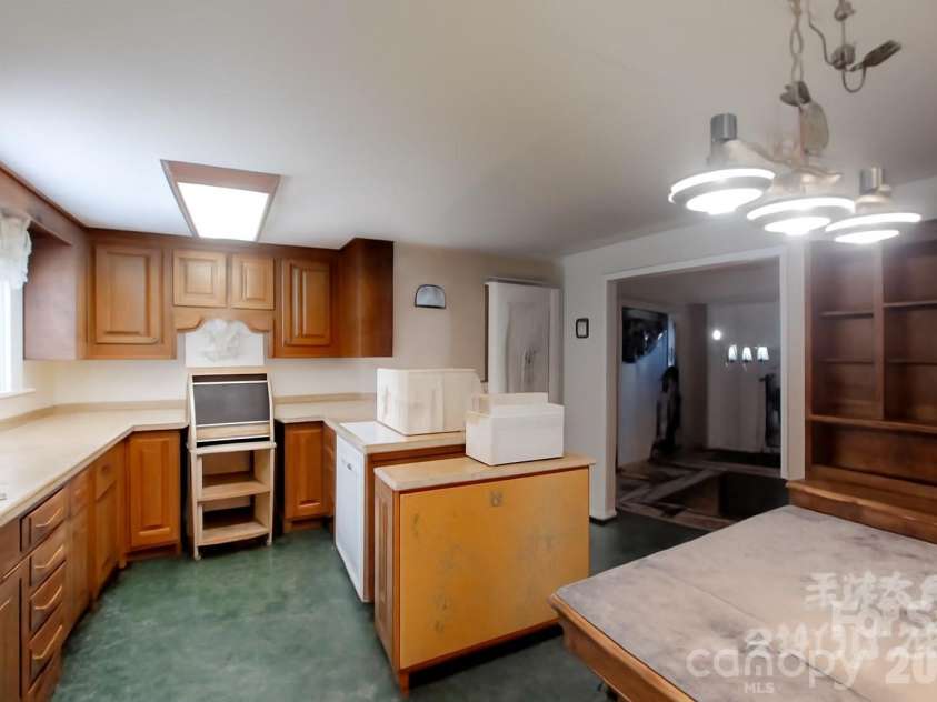 21 Maple Avenue, Candler, NC 28715.  MLS# CAR4273168, YatesRealty ID 2014. Virtually enhanced