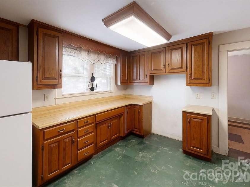 21 Maple Avenue, Candler, NC 28715.  MLS# CAR4273168, YatesRealty ID 2014. Virtually enhanced