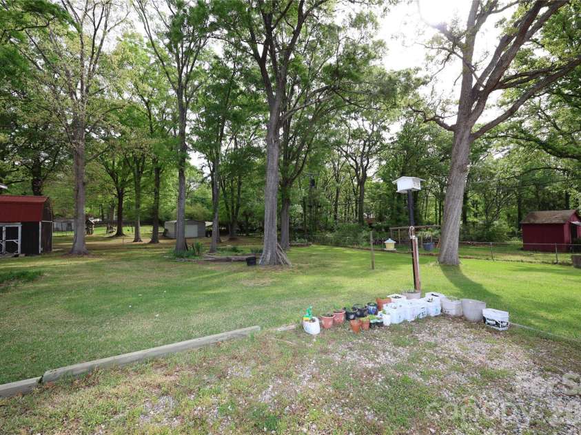 104 Pinetree Drive, Matthews, NC 28104.  MLS# CAR4367839, YatesRealty ID 20140. 