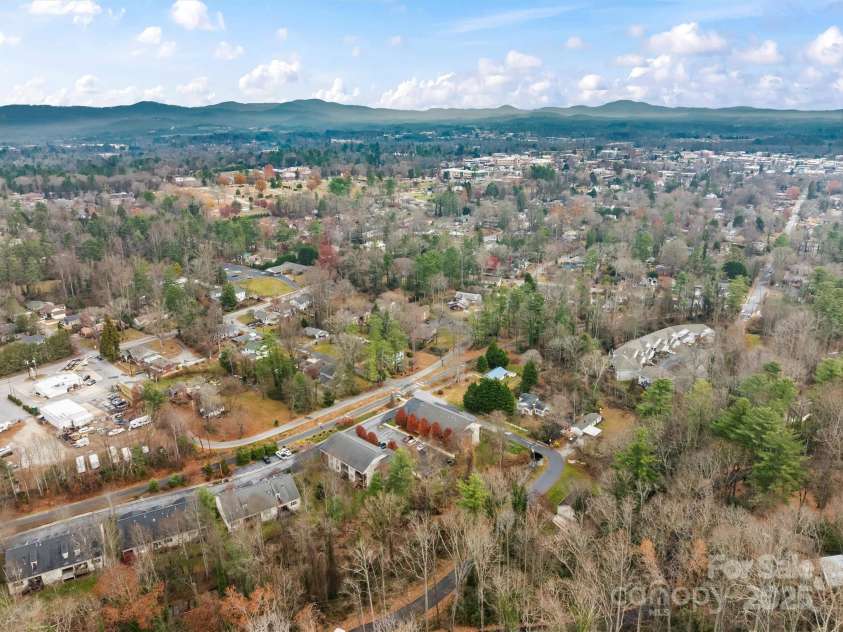 234 Wash Creek Drive, Hendersonville, NC 28739.  MLS# CAR4325434, YatesRealty ID 20140. Aerial view not labeled.