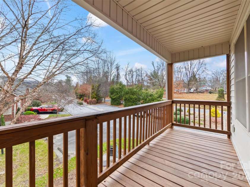 234 Wash Creek Drive, Hendersonville, NC 28739.  MLS# CAR4325434, YatesRealty ID 20140. Back deck with a view of the trail.