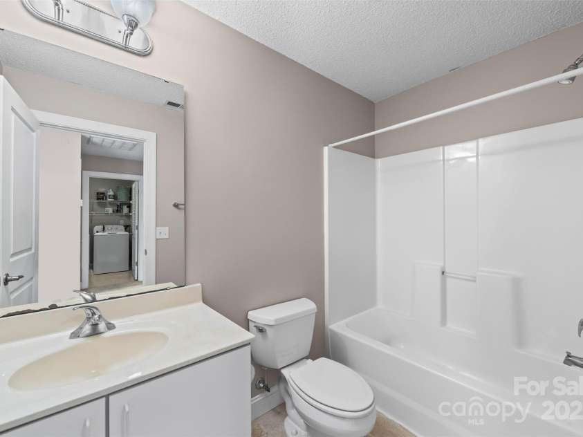 234 Wash Creek Drive, Hendersonville, NC 28739.  MLS# CAR4325434, YatesRealty ID 20140. Guest bathroom