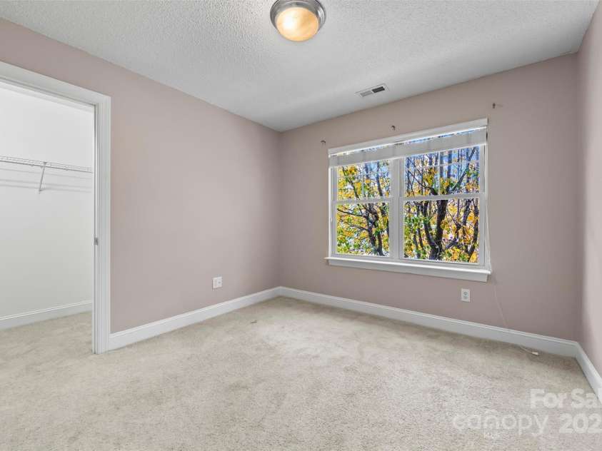 234 Wash Creek Drive, Hendersonville, NC 28739.  MLS# CAR4325434, YatesRealty ID 20140. Guest bedroom