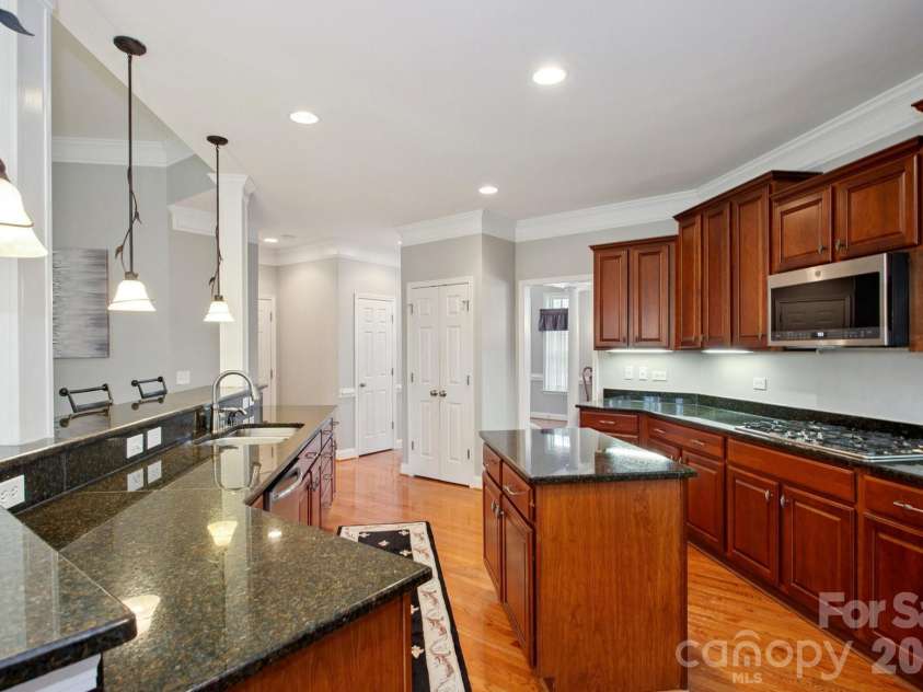9018 Kensington Forest Drive, Harrisburg, NC 28075.  MLS# CAR4360235, YatesRealty ID 20144. 