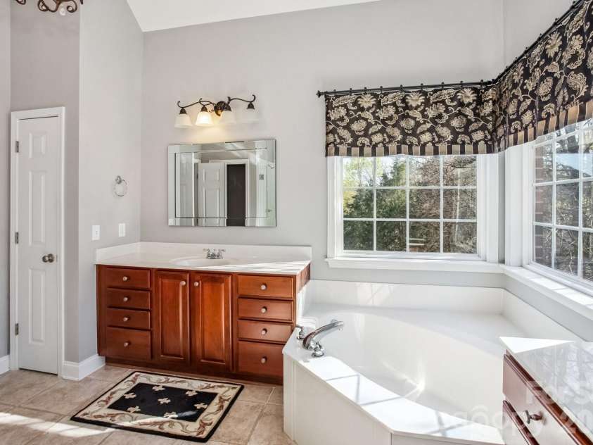 9018 Kensington Forest Drive, Harrisburg, NC 28075.  MLS# CAR4360235, YatesRealty ID 20144. 