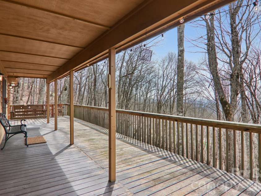 2665 El Miner Drive, Mars Hill, NC 28754.  MLS# CAR4374532, YatesRealty ID 20145. Front deck with covered & uncovered sections.