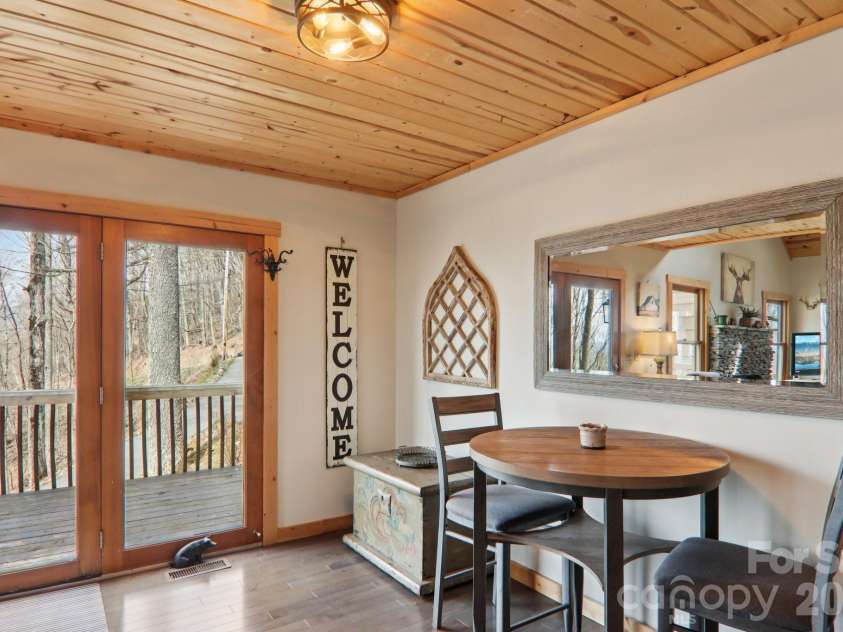 2665 El Miner Drive, Mars Hill, NC 28754.  MLS# CAR4374532, YatesRealty ID 20145. Front entrance & Dining area