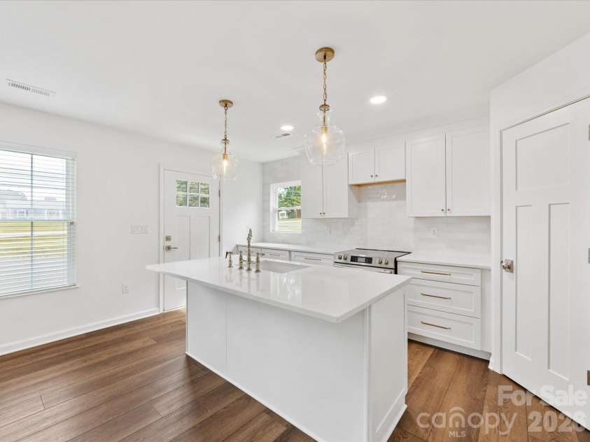 100 Forest Hills Drive, Monroe, NC 28112.  MLS# CAR4353171, YatesRealty ID 20151. Guest Cottage Kitchen