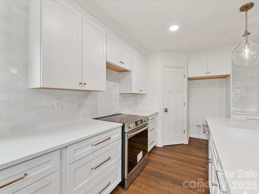 100 Forest Hills Drive, Monroe, NC 28112.  MLS# CAR4353171, YatesRealty ID 20151. Guest Cottage Kitchen