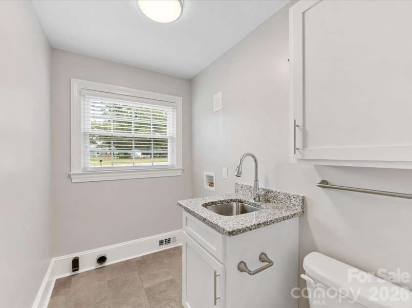 100 Forest Hills Drive, Monroe, NC 28112.  MLS# CAR4353171, YatesRealty ID 20151. Half Bath