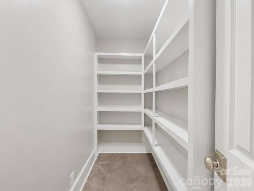 100 Forest Hills Drive, Monroe, NC 28112.  MLS# CAR4353171, YatesRealty ID 20151. Pantry