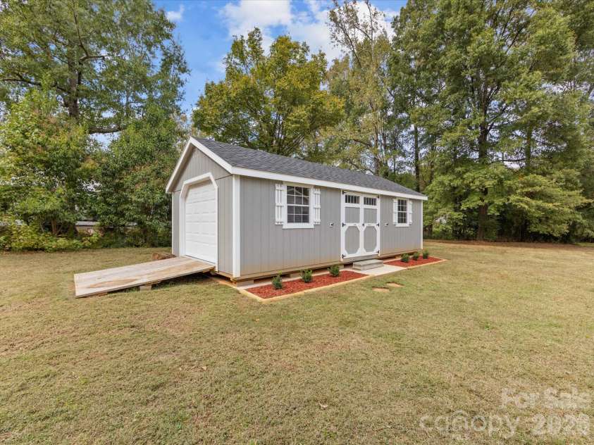 100 Forest Hills Drive, Monroe, NC 28112.  MLS# CAR4353171, YatesRealty ID 20151. Storage Building