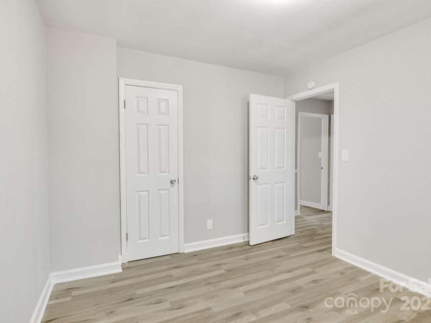 3637 Glenville Avenue, Charlotte, NC 28215.  MLS# CAR4257290, YatesRealty ID 20152. Second shot of third bedroom, facing entry door on right.
