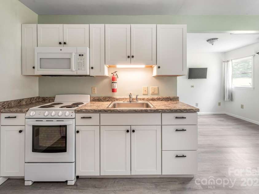 546 Scronce Creek Road, Burnsville, NC 28714.  MLS# CAR4243837, YatesRealty ID 20153. Apartment Kitchen