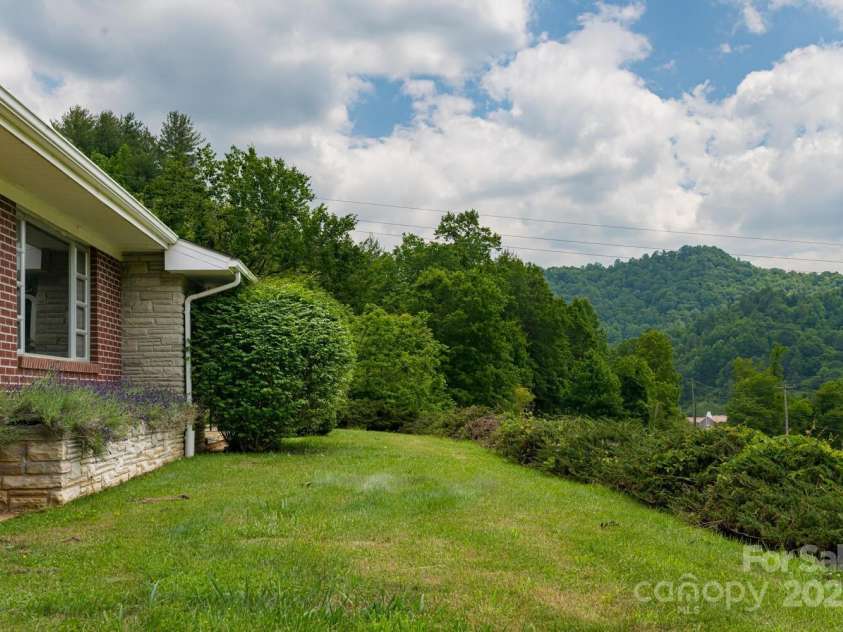 546 Scronce Creek Road, Burnsville, NC 28714.  MLS# CAR4243837, YatesRealty ID 20153. Front Yard with View