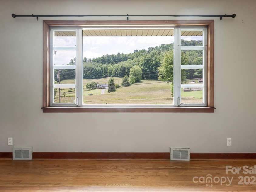 546 Scronce Creek Road, Burnsville, NC 28714.  MLS# CAR4243837, YatesRealty ID 20153. Living Room View