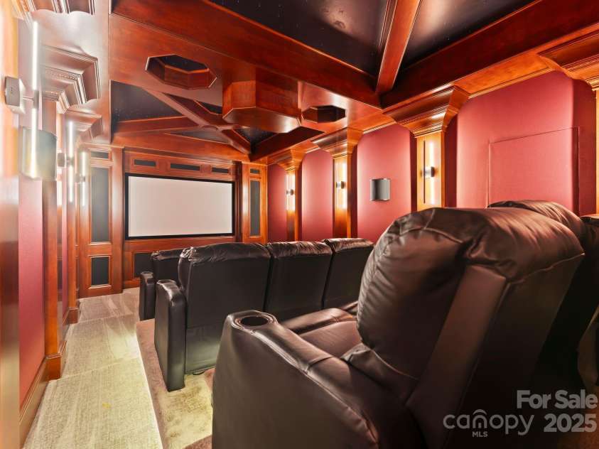 172 Tennessee Circle, Mooresville, NC 28117.  MLS# CAR4252701, YatesRealty ID 20154. Home Theater with three rows of seating and an immersive starry ceiling.