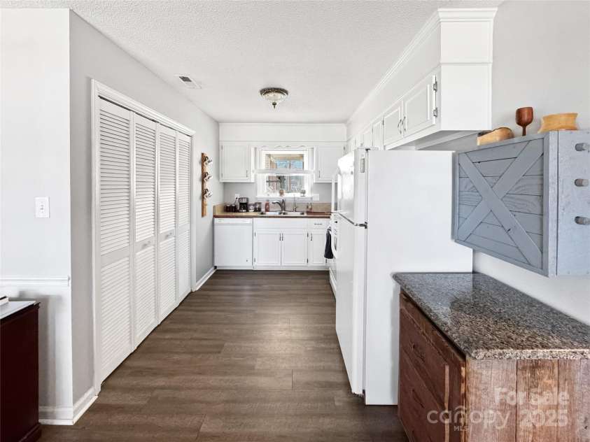 2316 Woodfield Circle, Gastonia, NC 28056.  MLS# CAR4266028, YatesRealty ID 20157. Laundry in kitchen