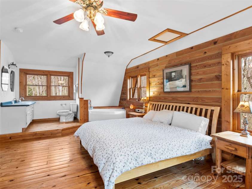 1239 Lower Loop Drive, Fletcher, NC 28732.  MLS# CAR4327631, YatesRealty ID 2016. 2nd view of primary bedroom in open loft