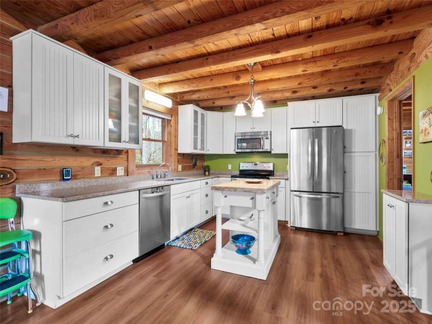 1239 Lower Loop Drive, Fletcher, NC 28732.  MLS# CAR4327631, YatesRealty ID 2016. Beautifully updated kitchen