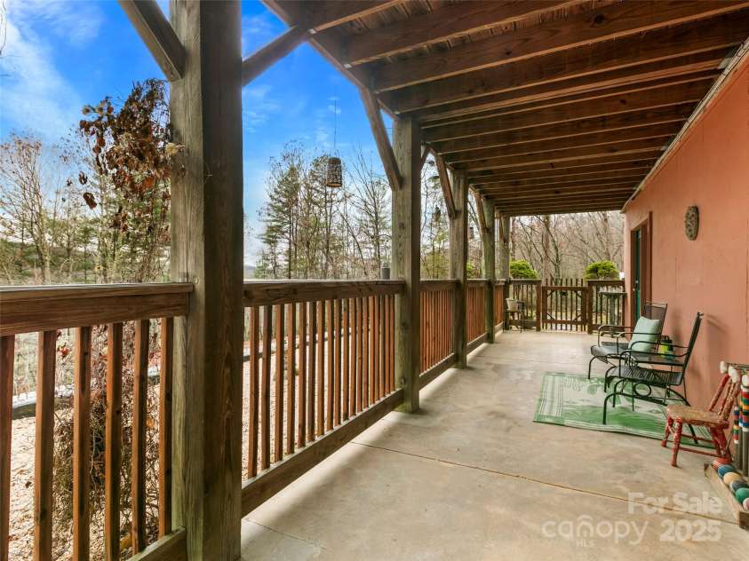 1239 Lower Loop Drive, Fletcher, NC 28732.  MLS# CAR4327631, YatesRealty ID 2016. Covered patio on basement level