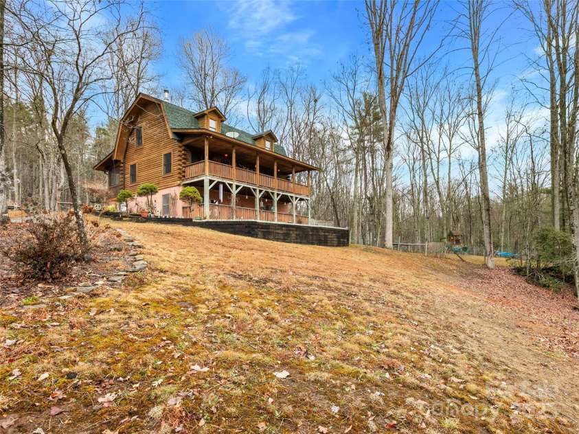 1239 Lower Loop Drive, Fletcher, NC 28732.  MLS# CAR4327631, YatesRealty ID 2016. Private 4.37 acres
