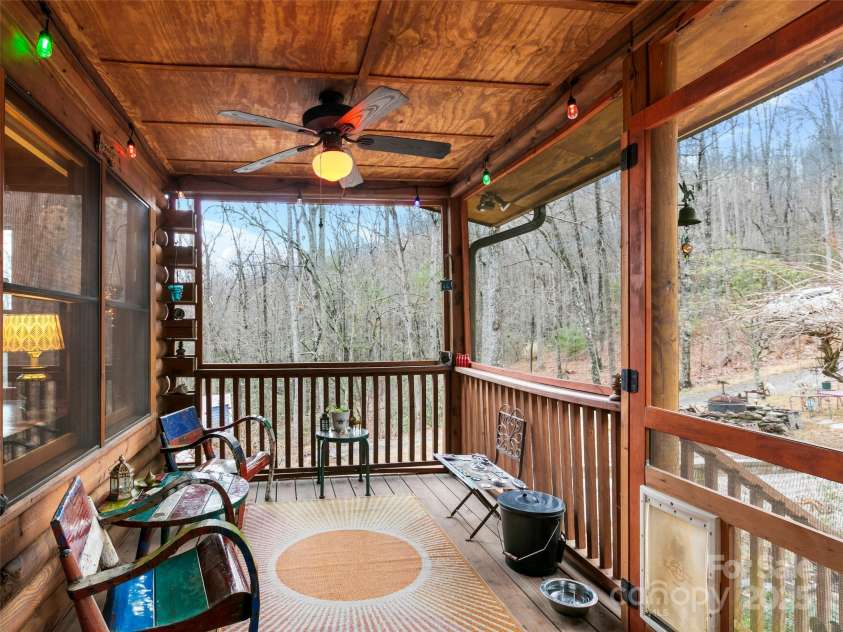 1239 Lower Loop Drive, Fletcher, NC 28732.  MLS# CAR4327631, YatesRealty ID 2016. Screened back porch