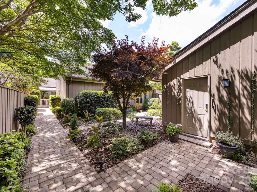 5128 Dunes Court, Charlotte, NC 28226.  MLS# CAR4249408, YatesRealty ID 20161. Courtyard entrance from garage