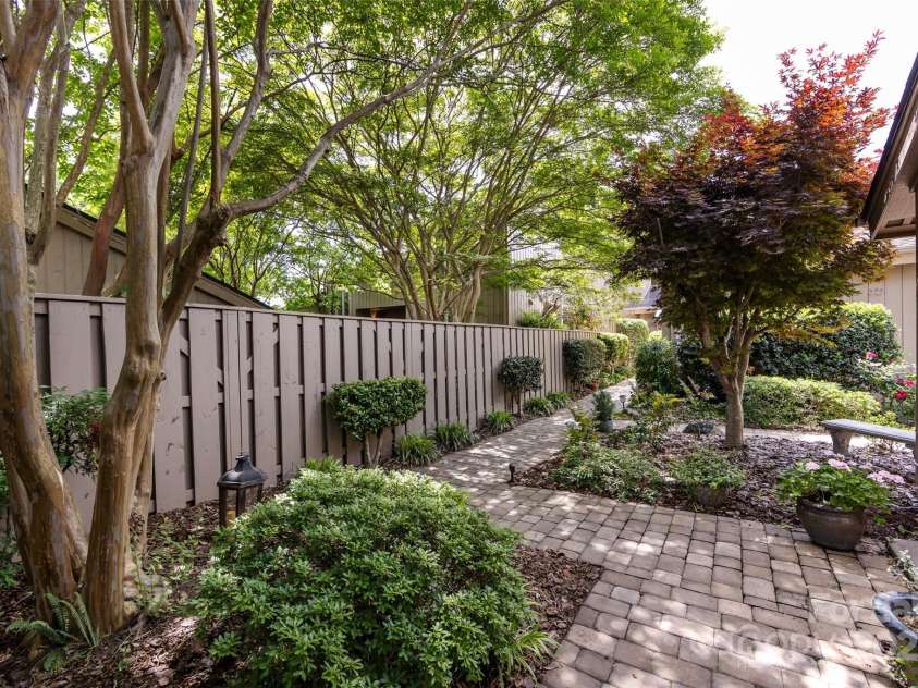 5128 Dunes Court, Charlotte, NC 28226.  MLS# CAR4249408, YatesRealty ID 20161. Front Courtyard with paver walkway