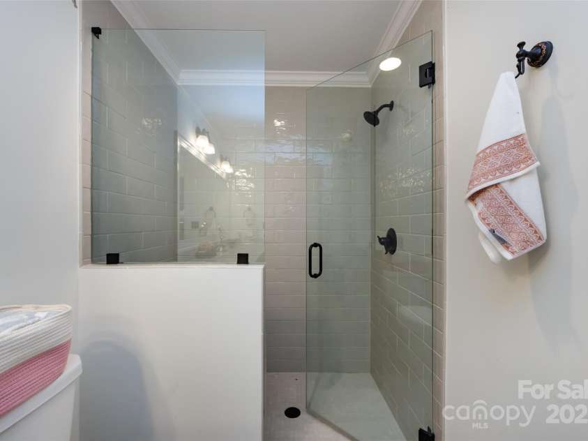 5128 Dunes Court, Charlotte, NC 28226.  MLS# CAR4249408, YatesRealty ID 20161. Large frameless Shower