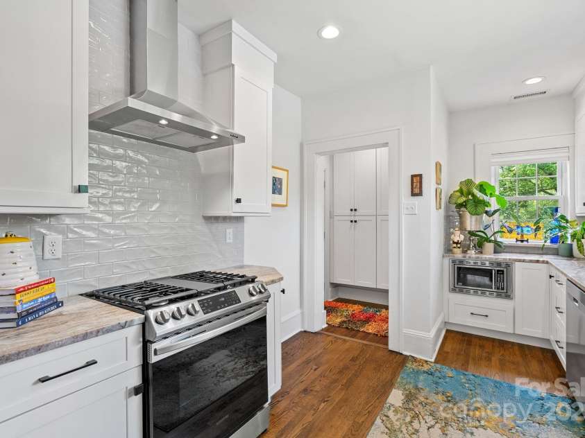 140 Pennsylvania Avenue, Asheville, NC 28806.  MLS# CAR4293015, YatesRealty ID 20162. Kitchen looking towards pantry at back of the house
