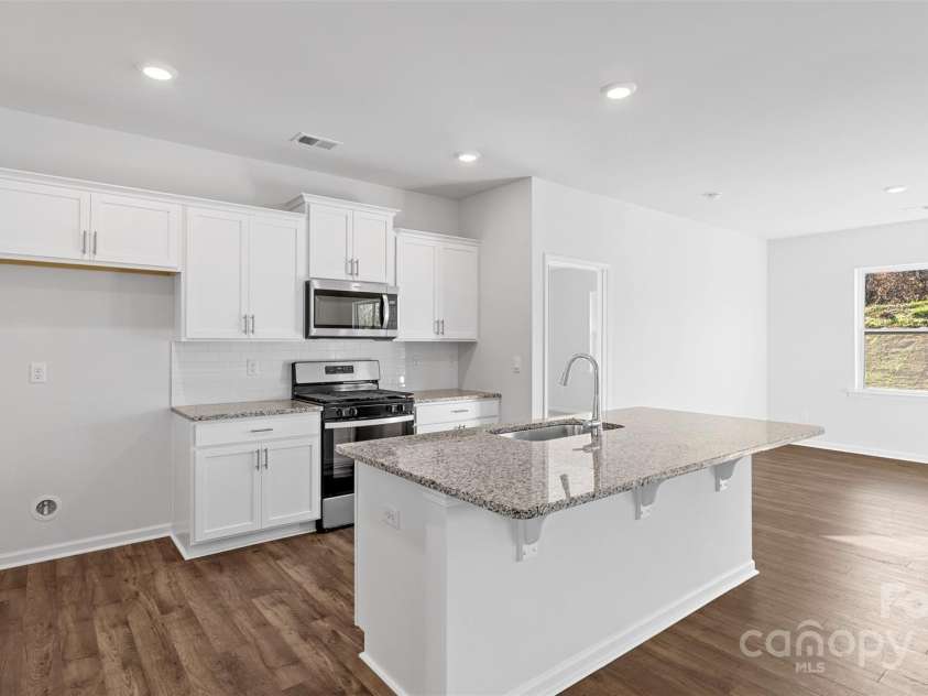 52 Woodvale Drive, Waynesville, NC 28786.  MLS# CAR4210726, YatesRealty ID 20163. Photos are representative