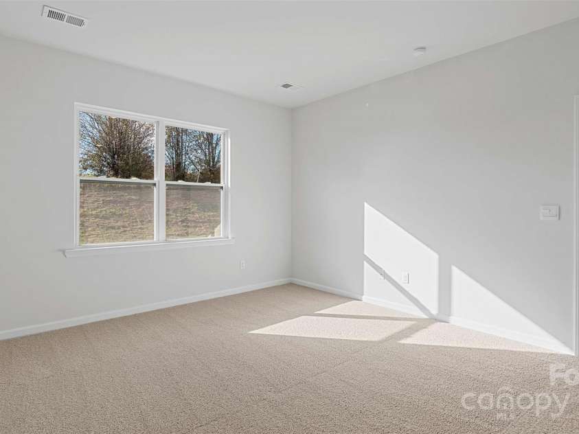 52 Woodvale Drive, Waynesville, NC 28786.  MLS# CAR4210726, YatesRealty ID 20163. Photos are representative