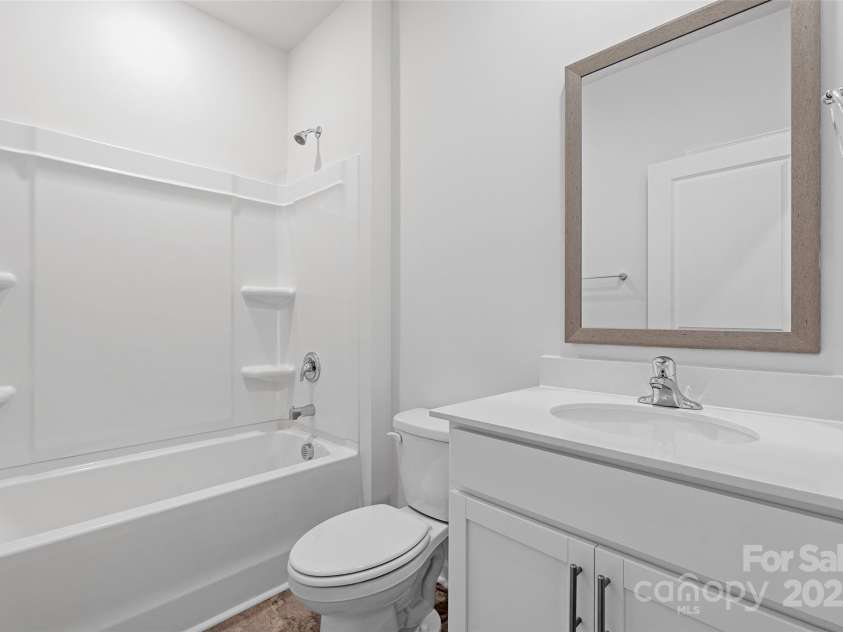 52 Woodvale Drive, Waynesville, NC 28786.  MLS# CAR4210726, YatesRealty ID 20163. Photos are representative