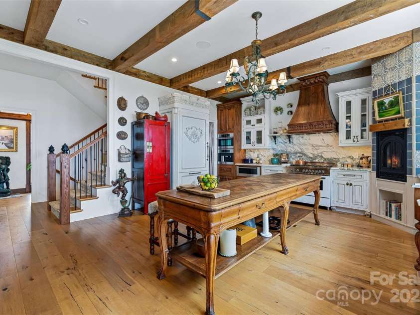 278 Snow Ridge Drive, Hendersonville, NC 28792.  MLS# CAR4221130, YatesRealty ID 20164. View of the kitchen with custom cabinetry, 