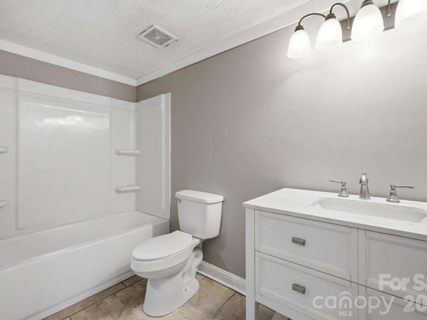 1050 21st Avenue, Hickory, NC 28601.  MLS# CAR4399644, YatesRealty ID 20166. 
