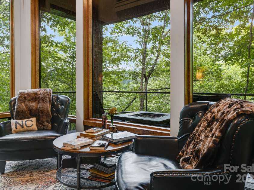 265 Laurel Branch Road, Canton, NC 28716.  MLS# CAR4231718, YatesRealty ID 2017. Cozy living area for reading, bird watching, or just doing nothing at all.