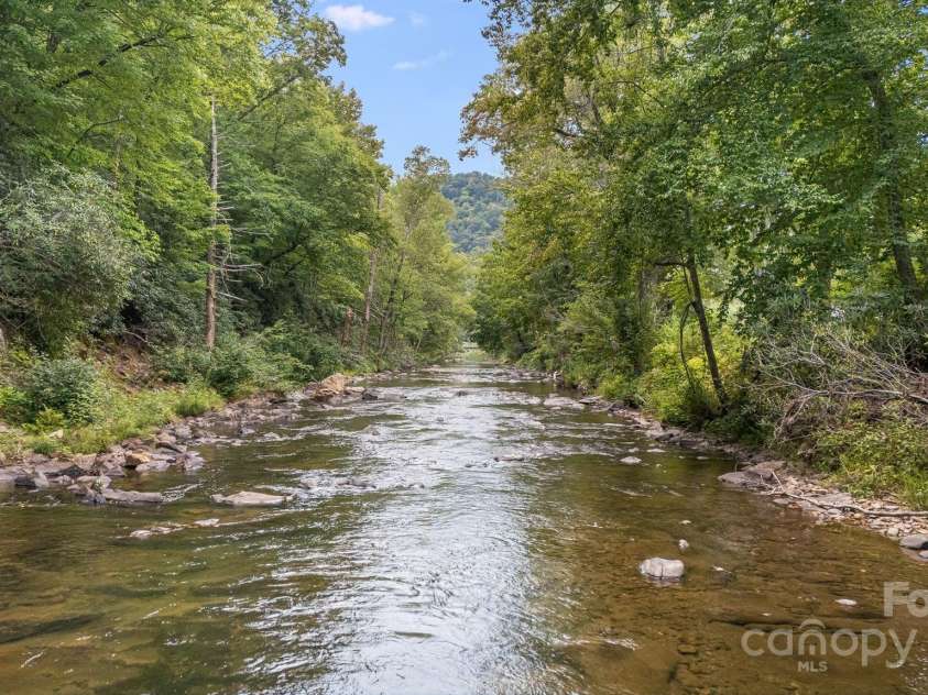 265 Laurel Branch Road, Canton, NC 28716.  MLS# CAR4231718, YatesRealty ID 2017. Enjoy private access to the East Fork Pigeon River from your property!