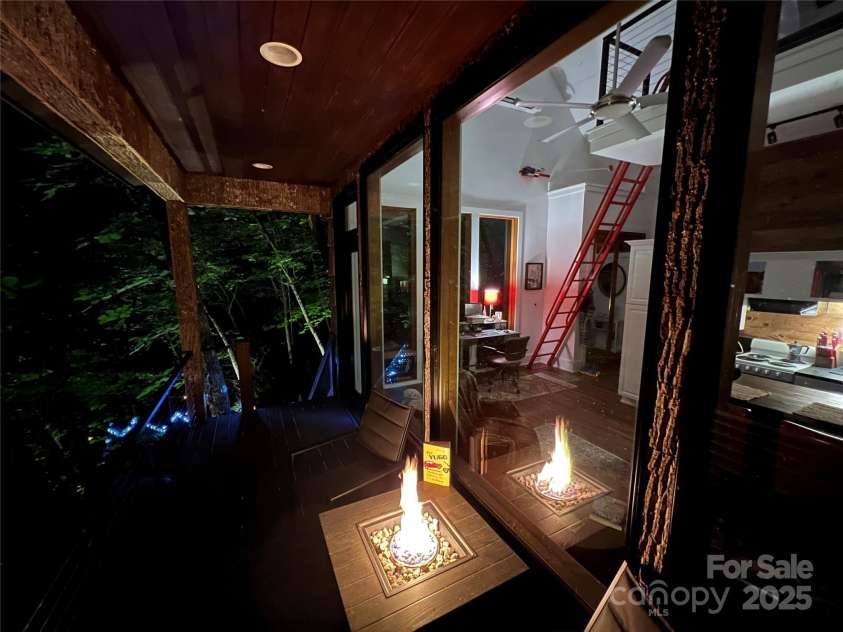 265 Laurel Branch Road, Canton, NC 28716.  MLS# CAR4231718, YatesRealty ID 2017. Fireside evenings on your cantilevered deck, 30 feet above the ground, at your cabin in the trees!