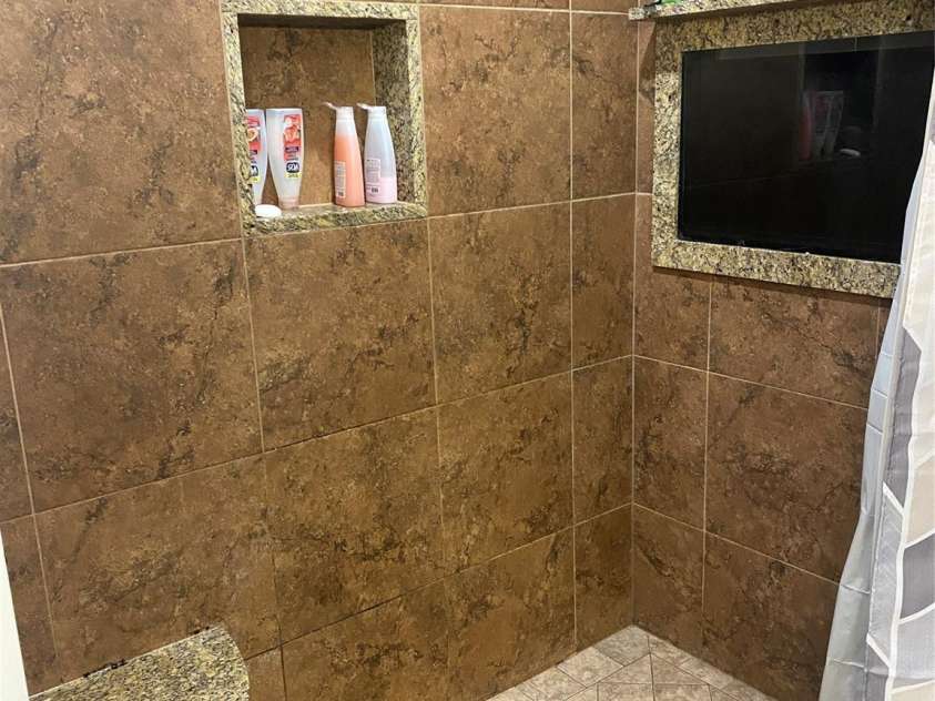 2818 Rockford Road, Shelby, NC 28152.  MLS# CAR4200590, YatesRealty ID 2017. WalkIn Shower with TV