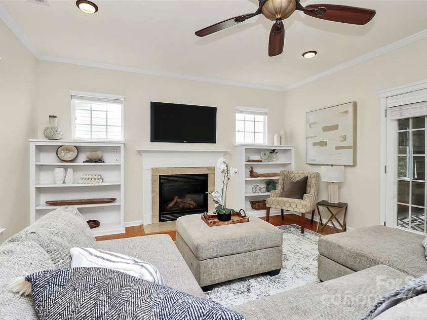 14904 Rosemary Way Drive, Huntersville, NC 28078.  MLS# CAR4266455, YatesRealty ID 20172. Builtin bookshelves, fireplace in living area