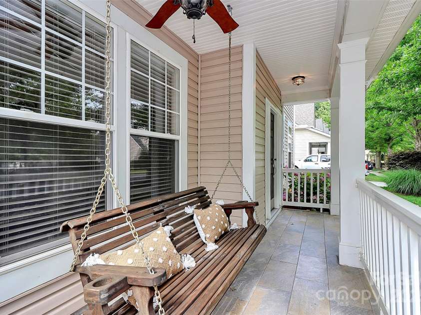 14904 Rosemary Way Drive, Huntersville, NC 28078.  MLS# CAR4266455, YatesRealty ID 20172. Front porch swing