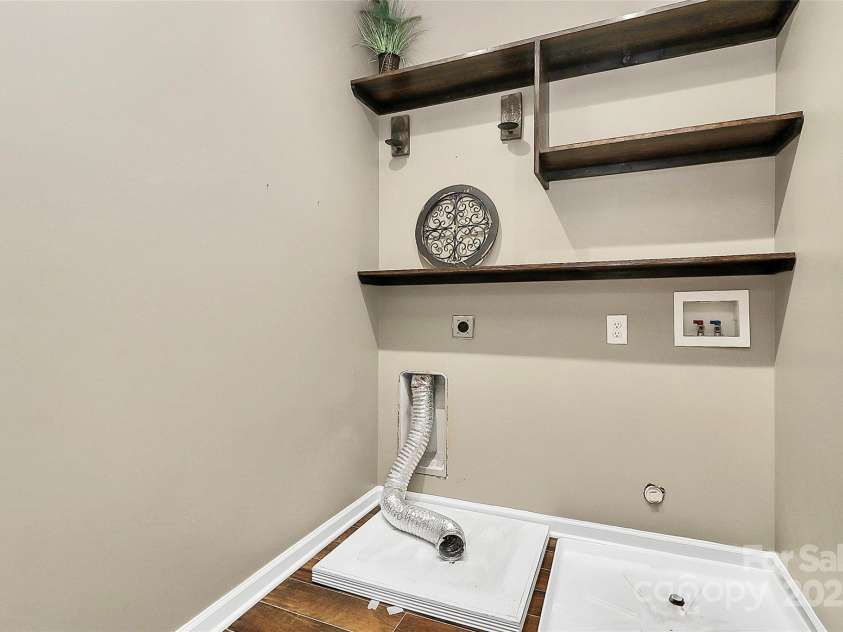 14904 Rosemary Way Drive, Huntersville, NC 28078.  MLS# CAR4266455, YatesRealty ID 20172. Uptairs Laundry room